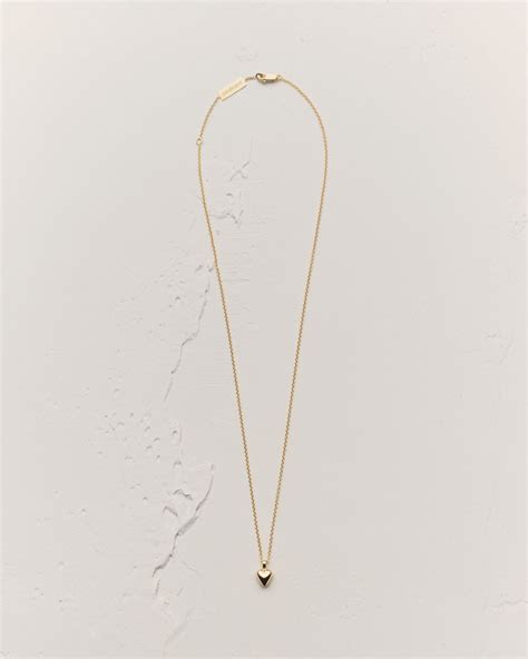 collier yves saint laurent ysl|Collier à pendentif cœur en or jaune 18 carats .